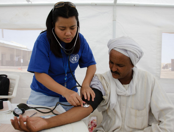 04 July 2011: Medical exam by a UNAMID doctor of an ex-combattant during the first day of a demobilzation programme in El Fasher. 

This DDR programme  is run jointly by UNAMID and the North Sudan Disarmament, Demobilization and Reintegration (DDR) Commission. 400 ex-combatants from the Sudan Alliance Forces (SAF), Popular Defence Forces (PDF) and DOCs (Declaration of Commitment) signatories (mainly Sudan Liberation Army (SLF) factions) are expected to be demobilized in the coming days.

 Picture: UNAMID - Olivier Chassot